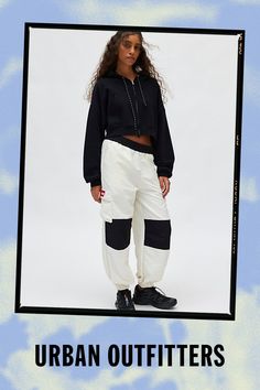 Sporty-cool The North Face track pant in a relaxed, jogger style. Crafter in a soft, fleeced knit featuring a mid-rise elasticated waistband, cargo-inspired pockets and cinched hems that crop at the ankle. Topped with classic TNF embroidery. Features The North Face HMLYN track pant Athleisure pant Soft & stretchy fleeced knit Mid-rise elasticated waistband with internal drawstring tie Cargo pockets & The North Face logos down leg Cinched hems Relaxed, slouchy fit Ankle length Easy pull-on style Content + Care 100% Recycled polyester Machine wash Imported Size + Fit Model in White is 5’9" and wearing size Small Measurements taken from size Small Inseam: 28" | The North Face HMLYN Track Pant in White, Women's at Urban Outfitters Sporty Sweatpants With Elastic Cuffs For Streetwear, Athleisure Streetwear Joggers With Elastic Cuffs, Sporty Streetwear Joggers With Elastic Cuffs, Trendy Leisure Joggers With Elastic Cuffs, Athleisure Joggers With Elastic Cuffs For Streetwear, Spring Streetwear Joggers With Elastic Cuffs, Sporty Fall Sweatpants With Cargo Pockets, Winter Sporty Cargo Pants With Elastic Waistband, Sporty Sweats With Elastic Cuffs For Streetwear