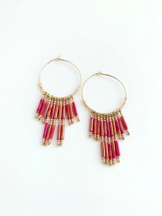 Modern fringe hoop earrings could be your next go to earring. They are super light weight, will give a pop of color to your outfit, and have just the right amount of movement. Colors in earring: dark pink, light pink, gold. Pink Hoop Beaded Earrings For Festival, Bohemian Pink Hoop Earrings With Round Beads, Trendy Pink Earrings With Dangling Beads, Pink Fringe Earrings For Festival, Pink Bohemian Hoop Earrings, Bohemian Pink Hoop Earrings, Pink Small Hoop Beaded Earrings With Dangling Beads, Pink Beaded Fringe Earrings For Party, Pink Trendy Dangle Chandelier Earrings