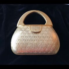 Rare, Never-Used, Unique, Vintage (1960’s) Purse By Harry Rosenfeld. Hard Metal With Embossed Flowers And Lattice Design. Metal Handle Is Brushed Matte Gold With Flap Clasp. Interior Is Gold Velvet With Ornate Ribbon A True Classic! Metal Purse, Metallic Purse, Hard Metal, Lattice Design, Gold Velvet, Matte Gold, Lattice, Vintage Gold, Unique Vintage