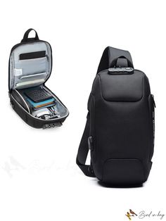 an open laptop bag sitting on top of a white table next to a black backpack