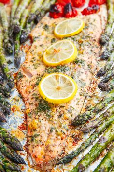 grilled salmon with asparagus, tomatoes and lemons