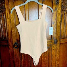 New With Tags. Perfect Condition Skin Tone Bodysuit. Great For All The Summer Fun You’ll Be Having! From A Smoke Free Home. Offers Welcome! Abercrombie & Fitch. A&F. Abercrombie And Fitch. Stretch One-piece Leotard For Spring, One-piece Stretch Leotard For Spring, One-piece Stretch Tops For Swimming, Fitted One-piece Lined Tops, Beige Bodysuit, Tan Bodysuit, High Neck Bodysuit, Turtleneck Bodysuit, Square Neck Bodysuit