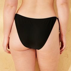 Low-rise bikini bottom from Wild Fable™ in black. Made from recycled polyester tricot fabric with spandex and full lining. Extra-cheeky high-leg cut flatters your figure. Side string ties make it easy to find the perfect fit. Picot bow trim completes the look with an elegant touch. If you're not satisfied with any Target Owned Brand item, return it within one year with a receipt for an exchange or a refund. Wild Fable™: A look for every story. Nylon Tankini With Tie-side Bottom, Solid Color Tankini With Tie-side Bottom For Poolside, Solid Color Poolside Tankini With Tie-side Bottom, Solid Color Nylon Tankini With Tie-side Bottom, Solid Color Tie-side Pool Bottoms, Solid Seamless Tie-side Swimwear Bottom, Solid Color Tie-side Bottoms For Pool, Solid Color Seamless Swimwear With Tie-side Bottom, Solid Color Seamless Tie-side Swimwear Bottom