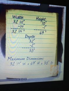 a piece of paper that has been written on it with height and width measurements in front of the screen