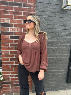 Get ready to FALL in love with our must-have blouse of the season! With its perfect transitional design, this blouse is the perfect addition to your fall wardrobe. Say goodbye to boring and hello to stylish with our FALLing In Love Blouse. Sydney is wearing a small. Elegant V-neck Peasant Top For Fall, Fall Puff Sleeve Long Top For Day Out, Trendy Lantern Sleeve Blouse For Day Out, Chic Lantern Sleeve Peasant Top For Fall, Chic Fall Peasant Top With Lantern Sleeves, Fall Brunch Blouse With Lantern Sleeves, Fall Brunch Lantern Sleeve Blouse, Trendy Long Sleeve Puff Sleeve Top For Fall, Trendy Puff Sleeve Long Sleeve Top For Fall