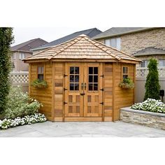 a wooden garden shed with the price tag for $ 4 99 / ft w x 9 ft d wood garden shed