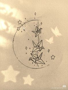 a drawing of some origami birds flying in the sky with stars around it