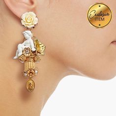 Dolce & Gabbana Cherub Earrings Flower Saint Mary Charm Made In Italy Brand: Dolce&Gabbana Metal: Brass Style: Dangle/Drop Colour: Gold Accents: Enamel Cherub / Flower Details / Saint Mary Charm Closure: Clip-On Department: Women Main Stone: Crystal Exact Material: 75%Brass,20%Resin,5%Crystal Country/Region Of Manufacture: Italy This Item Comes With A Branded Box & Certificate Of Authenticity. The Color Of The Goods In The Photos May Differ Because Of Some Of The Features * Approximate Measureme Designer White Earrings For Evening, Designer White Earrings For Party, Dolce And Gabbana Jewelry, Cherub Earrings, Dolce Gabbana Jewelry, Blue Crystals Stones, Dolce And Gabbana Earrings, Bow Women, Crystal Cross