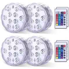 four different color lights with remote controls