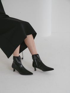 Editor's NoteOI PAINTED's shoe will add elegance to your daily outlook- Modern soft pointed toe - Soft and subtle gloss leather texture- Set on a stacked heel- Basic silhouette with feminine mood- Daily point itemMeasurements (in.)- Heel: 2.0in.- Size: US 5.5(KR225mm) - US 8 (KR250mm)- This item is based on the KR shoe size. Please refer to the size chart.Composition & Care- Upper: Sheepskin- Lining: Synthetic leather- Outsole: Rubber- Professional leather care onlyDesigner- by OI PAINT Low Heel Boots With Sculpted Heel For Work, Classic Heeled Boots With Stacked Heel And Pointed Toe, Pointed Toe Boots With Sculpted Heel For Work, Pointed Toe Boots With Stacked Heel For Business, Ankle-high Heels With Contrasting Heel Counter For Work, Elegant Low Heel Boots With Stacked Heel, Elegant Heeled Boots With Stacked Low Heel, Business Boots With Stacked Heel And Pointed Toe, Workwear Boots With Sculpted Heel And Pointed Toe