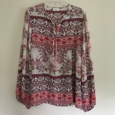 Dee Elly From Vici Long Sleeve Tie Neck Top. Off-White With Deep Red And Pink Print. Beautiful Light And Flowy Top. Nwot. Brand New And Never Worn Without Tags. Women's Size Small. Comment With Any Questions. *Bundle With Other Items In My Closet For An Extra Discount.* White Blouse With Boho Print For Fall, Boho Print Long Sleeve Blouse For Day Out, Long Sleeve Boho Print Blouse For Day Out, White Flowy Printed Tops, White Long Sleeve Feminine Peasant Top, Flowy White Printed Top, White Boho Print Top For Spring, White Long Sleeve Blouse With Boho Print, Long Sleeve Boho Print Blouse For Brunch