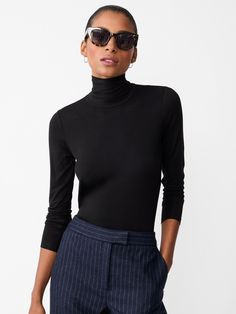 A foundational piece for every wardrobe, our tissue-thin Nadia Turtleneck is incredibly easy to layer or simply wear on its own. | J.McLaughlin Women's Nadia Turtleneck Top Black, Size XS | Spandex Black Turtleneck Outfit, Turtleneck Fashion, Turtleneck Outfit, J Mclaughlin, Turtleneck Top, Black Turtleneck, Turtle Neck Top, Black Solid, Women's Tops