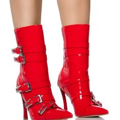 Be The Talk Of The Town With The Azalea Wang " Buckled Beauty " Buckle Detail Bootie In Red. This Sleek Bootie Is Made From A Faux Patent Leather Upper And Features A Pointed Toe Silhouette, Strappy Buckle Detail Accents, A Mid Calf-Height Shaft, And A Curved High Heel. Complete With A Back Ankle Zipper Closure. - Faux Patent Leather Upper - Pointed Toe - 7.25” Shaft Height - 4.31” Heel Height - 12” Shaft Opening Circumference - Imported Red Pointed Toe Heels With Buckle Closure, Red Patent Leather Heels With Buckle Closure, Red Closed Toe Boots For Party, Party Boots With Buckle Closure And Almond Toe, Glamorous Red High Heel Boots, Red Patent Leather Boots With Pointed Toe, Party Boots With Red Sole And Almond Toe, Sam Edelman Heels, Azalea Wang