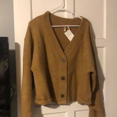 Tan H&M Cardigan, Kinda Baggy In The Sleeves And A Little Shorter Length. 52% Acrylic 30% Polyamide And 15% Wool. 3 Big Buttons On The Front. H&m Long Sleeve Cardigan For Fall, H&m Long Sleeve Fall Cardigan, H&m V-neck Fall Outerwear, H&m V-neck Cardigan For Spring, H&m V-neck Spring Cardigan, Casual H&m V-neck Cardigan, Brown Shawl, Fine Knit Cardigan, Oversized Sweater Cardigan