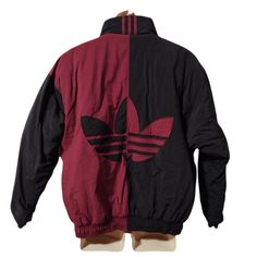 Vintage Adidas Mens Sz M Winter Jacket Trefoil Logo Maroon/Black Like New! Euc- Like New, Amazing Condition, No Stains Or Flaws That I Can See. A Fantastic Piece To Add To Your Collection All Measurements Are Approximate And Taken Unstretched And Laying Flat. Chest: 51" Length: 27" Sleeve: 30" Note To Buyers: Please Allow Up To 10 Business Days For Your Item To Ship, And An Additional 2-4 Days For Your Item To Arrive. **Colors May Vary Slightly From Photos Of Item, Due To Lighting, Camera, Editing, Screens, Etc.** If You Have Any Questions, Please Don't Hesitate To Send Me A Message. Please Feel Free To Check Out The Other Items Listed In My Store. Adidas Red Outerwear For Streetwear, Adidas Red Streetwear Outerwear, Adidas Track Jacket For Fall Outdoor, Adidas Track Jacket For Fall Outdoor Activities, Adidas Urban Winter Windbreaker, Adidas Black Track Jacket For Winter, Adidas Urban Track Jacket For Winter, Urban Adidas Winter Track Jacket, Adidas Fall Windbreaker For Outdoor