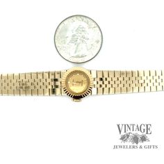 This polished, Vintage Ladies slide Rolex 18ky gold watch is a luxurious timepiece. Crafted with 18k yellow gold, this mechanical watch also features five different interchangeable Rolex watch bands so you can customize your look. Measuring 6.5” in length, it's a sophisticated addition to any collection. Vintage 18 karat yellow gold ladies Rolex mechanical watch 5 different interchangeable Rolex watch bands 6.5” in length Luxury Vintage Yellow Gold Watch, Timeless Yellow Gold Polished Watch Bands, Timeless Yellow Gold Watch Bands With Polished Finish, Timeless Yellow Gold Formal Watch Bands, Formal Yellow Gold Timeless Watch Band, Formal Timeless Yellow Gold Watch Band, Formal Yellow Gold Round Watch Bands, Luxury Gold Watches Stamped 14k, Timeless Gold Watch Bands For Anniversary