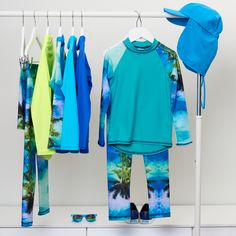 Our Tropical print is a favorite with our clients. There are so many items available in this print, ranging in sizes from 12 months up to 14-16Y Head over to our site now to check them all out! Tropical Horizon Long Sleeve Rash Guard #sunpoplife #sunprotectionclothing #rashguard #rashguards #sunprotectiveclothing #sunsafety #kidsrashguards #longsleeverashguards #kidsbeachwear #kidsswimwear #sunprotection Sun Protective Clothing, Kids Swimwear, Mock Neckline, Sun Rays, Kids Beachwear, Rash Guard, Tropical Print, Good Skin, Upf 50