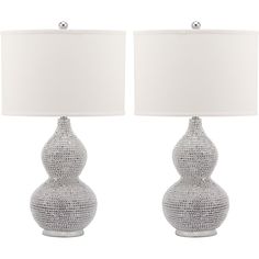 two white lamps sitting next to each other