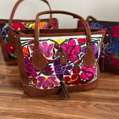 Beautiful Mexican Bag With Flower Embroidery, Ideal To Use On Any Occasion. Each Bag Is Uniquely Embroidered With Bright Colors On Silk Thread. Multicolor Floral Embroidered Tote Bag, Rectangular Bag With Multicolor Embroidery And Hand-stitched Details, Hand-stitched Rectangular Bag With Multicolor Embroidery, Folk Style Embroidered Multicolor Shoulder Bag, Folk Style Multicolor Embroidered Shoulder Bag, Artisan Bags With Multicolor Embroidery For Everyday Use, Multicolor Embroidered Tote Bag, Artisan Multicolor Embroidery Bags For Everyday Use, Traditional Multicolor Embroidered Floral Bag