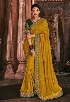 Kajal aggarwal mustard silk party wear saree 5180  Desc:  Style : Bollywood Sarees Color : Mustard Fabric : Silk Work : Embroidery Wash Care : Dry clean Sleeve Style : Half Sleeve Long Sleeves : Done only in Custom Stitch Sleeves Lining : Done only in Custom Stitch Bust Size : 32 to 42 Inches Occasion : Festival   Christmas   Diwali   Kitty Party   Party Wear   Engagement   Ceremonial   Baby Shower   Marriage Anniversary. With Express Free Shipping and Custom Stitching, Buy Indian Wedding Party Party Wear Indian Dresses Kollybollyethnics, Party Wear Sarees Online Kollybollyethnics, Gold Chinon Pre-draped Saree For Eid, Gold Chinon Pre-draped Saree For Navratri, Designer Gold Chinon Saree, Semi-stitched Gold Dola Silk Traditional Wear, Yellow Dola Silk Saree With Resham Embroidery, Festive Yellow Saree With Resham Embroidery, Semi-stitched Yellow Saree With Cutdana