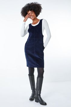 Button Corduroy Pinafore Shift Dress from Roman. Look cute in corduroy this season with this cord button pinafore dress. Featuring a round neckline and button detailing on the side seams this dress is perfect when layered over a t-shirt. To complete this look team with tights and ankle boots for an effortlessly casual look. Navy Tights, Corduroy Pinafore, Corduroy Pinafore Dress, Tights And Boots, Corduroy Dress, Pinafore Dress, Button Dress, Fashion Face, Dress Clothes For Women