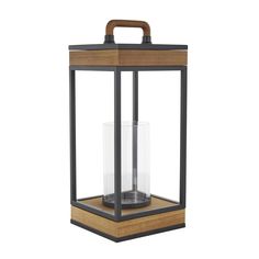 a wooden and metal lantern on a white background