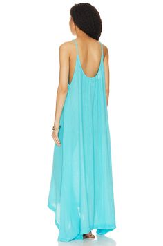 Beautiful maxi dress in an aqua color blue! Could fit small and medium because it has a stretch and is super flowy! 100% cotton Made in USA Hand wash Unlined Pull-on styling Crinkle gauze fabric Beautiful Maxi Dresses, Gauze Fabric, Aqua Color, Crop Top Blouse, Cutout Dress, Unique Dresses, Dress Suits, Cami Dress, Low Back