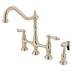 an antique style kitchen faucet with two handles