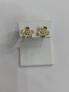 14k flower stud earrings - color gold finish - matches any outfits- great for daily use - great closure system - 100% 14k real gold- item sold by piece weight is undetermined Yellow Gold Plated Flower Earrings For Anniversary, Yellow Gold Flower Earrings In 14k, Fine Jewelry Yellow Gold Flower Earrings, Yellow Gold Flower-shaped Diamond Earrings, Rose Gold 14k Gold Flower Earrings, Formal Yellow Gold Flower Earrings, Gold Plated Yellow Gold Flower Earrings, Gold Clip-on Earrings In Flower Shape, Yellow Gold Plated Flower Earrings