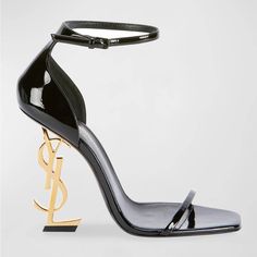 These Eye-Catching Ankle-Strap Sandals Feature A Unique Interlocking Ysl Logo Heel, Making A Bold Statement With Every Step. Condition: Never Worn Brand: Saint Laurent Size: 39 Material: Shiny Patent Leather Heel: 4.3" Golden Ysl Heel Design: Elongated Square Open Toe Style: D'orsay Silhouette Strap: Adjustable Ankle Strap Interior: Leather Lining Sole: Leather Outsole Extras: Includes Dust Bags Dr Shoes, Ysl Heels, Yves Saint Laurent Shoes, Ysl Shoes, Wedding Heels, Ankle Strap Pumps, Carrie Bradshaw, Patent Leather Heels, Footwear Design Women