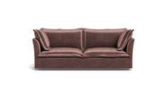 a brown couch sitting on top of a white floor