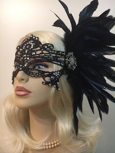 "Black Lace Masquerade Mask with Feathers and Crystals, Women's Lace Mask, Masked Ball, Wedding Masquerade Masks, Bridal Wedding Mask Beware of cheap imitations that use glue! This is an original design by IceGreenEyes. Stiffened and lace mask will not sweat your face like the cheap plastic ones. The mask is also shaped so you have lots of room around the eyes instead of a skinny slice. These masks are hand stitched, not held together with sticky glue that will heat up and fall apart before the Adjustable Masquerade Mask For Wedding Carnival, Elegant Adjustable Masquerade Mask For Wedding, Wedding Masquerade Mask With Rhinestones, Elegant Wedding Masquerade Mask Adjustable, Elegant Adjustable Wedding Masquerade Mask, Elegant Wedding Masks, Black Masquerade Mask For Wedding Carnival, Carnival Rhinestone Masquerade Mask, Black Wedding Headpiece For Carnival