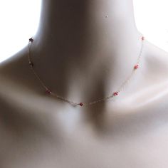 This dainty necklace is minimal and simple, with wire-wrapped Ruby gemstones on 14k Gold Filled chain or 925 sterling silver chain. This necklace is worn alone or layered with others. * natural ruby faceted beads - natural gemstone, please keep in mind that the size and color may vary slightly. * 2mm 14k gold filled or 925 sterling silver round beads * 14k gold filled or 925 sterling silver delicate cable chain, spring clasp - Our 14k Gold filled products are made in the USA * 24k gold filled or 925 sterling silver extender chain * All components are gold filled or 925 sterling silver ✨made to order Minimalist Sterling Silver Station Necklace, Dainty Station Necklace With Satellite Chain, Minimalist 14k Gold-filled Birthstone Necklace With Delicate Chain, Delicate 14k Gold Filled Birthstone Necklace With Delicate Chain, Minimalist 14k Gold Filled Birthstone Necklace With Delicate Chain, Minimalist Station Necklace With Satellite Chain As A Gift, Dainty 14k Gold Filled Birthstone Necklace With Delicate Chain, Dainty Birthstone Necklace With Adjustable Chain, Minimalist Station Necklace With Satellite Chain For Gift