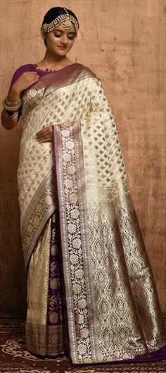 Beige and Brown, Purple and Violet color Saree in Banarasi Silk, Silk fabric with Weaving work White Traditional Wear With Meenakari Drape, Wedding Saree With Zari Work And Brocade, Wedding Saree With Zari Work In Brocade, Brocade Saree With Zari Work For Wedding, White Self-design Dupatta For Reception, Brocade Saree With Pallu For Wedding, White Saree With Zari Weaving For Reception, Wedding Brocade Saree With Pallu, White Banarasi Silk Saree For Wedding