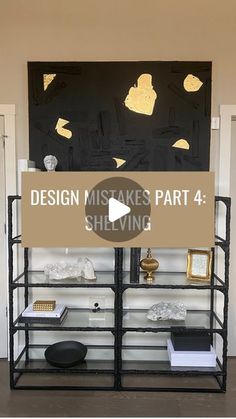 a black and gold display case in a room with the words design makes part 4 shelving