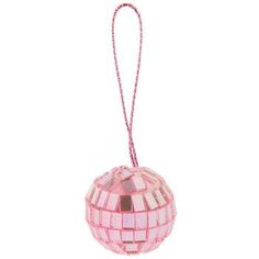 a pink ornament hanging from a string