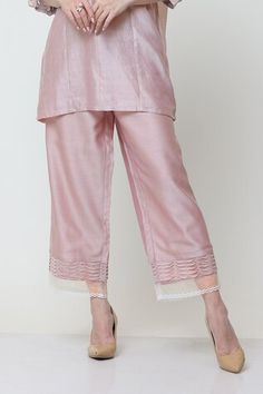 Pink short kurta with placed floral cutwork patterns  sleeves, pleated bodice and pearl embellishments. Comes with sheer panel pant. - Aza Fashions Fitted Cutwork Sets, Elegant Chikankari Embroidered Bottoms For Summer, Elegant Summer Bottoms With Chikankari Embroidery, Floral Embroidered Straight Pants For Workwear, Floral Embroidery Straight Pants For Workwear, Floral Embroidery Straight Pants For Work, Chikankari Embroidery Sets For Workwear, Elegant Pink Cutwork Set, Elegant Pink Sets With Cutwork