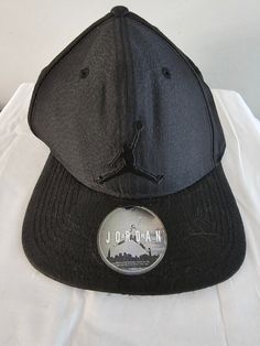 From Nike and Air Jordan this is a cool Jumpman baseball cap featuring the triple black style.  No tags but never used, sticker still on brim and brim is still solid. Shipping is FREE!! If you get a chance please check out my Etsy store where there is, dare I say....something for everyone :) Contact me if you want to purchase multiple items of mine, I give discounts for bundles! Nike Jumpman, Air Jordan Nike, Triple Black, Black Hat, Say Something, Black Style, Hat Cap, Nike Jordan, Trucker Cap