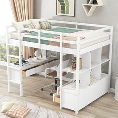 a white loft bed with desk underneath it