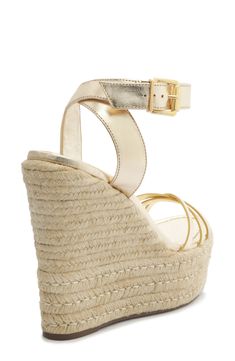 A gleaming buckle and rich leather upper lend luxe elements to an espadrille-inspired sandal lifted by a jute-wrapped platform and wedge heel. 5" heel; 2" platform (size 8.5) Leather upper and lining/synthetic sole Made in Brazil Luxury Summer Wedge Sandals With Wrapped Heel, Gold Espadrilles With Woven Sole For Vacation, Gold Espadrilles With Woven Sole For Spring, Summer Gold Espadrilles With Removable Insole, Gold Leather Sandals With Woven Sole, Gold Sandals With Woven Sole And Ankle Strap, Gold Ankle Strap Sandals With Woven Sole, Chic Gold Sandals With Woven Sole, Chic Leather Espadrilles With Buckle Closure