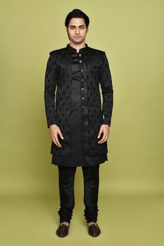 Black sherwani featuring leaf pattern. Paired with a solid sleeveless inner kurta. - Aza Fashions Transitional Black Sherwani With Cutdana, Black Nehru Jacket With Zari Work, Ceremonial Black Sherwani With Cutdana, Black Sherwani With Chikankari Embroidery, Black Bandhgala Straight Kurta, Black Chikankari Embroidered Sherwani, Black Chikankari Embroidery Sherwani, Designer Black Nehru Jacket With Chikankari Embroidery, Black Straight Kurta Bandhgala For Festive Season