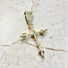 CLEARANCE - 40% OFF! Original vintage 14 karat yellow gold cross pendant featuring a single cut diamond in the center weighing approximately 0.10 carat, G-H color VS clarity. It is surrounded by 6 round synthetic rubies weighing approximately 0.20 carat. Weighs 5.4 grams. L: 1.96”. Birthstone: April/July. Condition: Very Good. Light scratches throughout metal. - Free insured shipping in the US. - International shipping available. Note: This item has been appraised and inspected by a vintage jewe Classic 14k Gold Crucifix Jewelry, Classic 14k Gold Crucifix Jewelry And Charms, Gold Cross Pendant, Diamond Cross Pendants, Diamond Cross, Ruby Diamond, Gold Cross, Cross Pendant, Birthstone