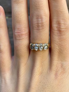 Total Weight: 3.4 grams Size: 6.5 Band Width: 2.8-4mm  Cubic Zirconia: 6x3.5mm Condition: In great condition showing little wear with no damage.  All gold has been thoroughly checked with an Olympus XRF spectrometer. It is guaranteed 14k gold.  All our jewelry is properly washed and disinfected to ensure customers get clean items with every order.  Returns accepted but may be subjected to a restock fee.  Please message with any questions:) Anniversary Jewelry With Baguette Cut Lab Grown Diamond, Anniversary Baguette Cut Lab Grown Diamond Jewelry, Anniversary White Topaz Wedding Ring With Baguette Cut, Oval Lab Grown Diamond Ring With Vs Clarity, Oval Lab-grown Diamond Ring With Vs Clarity, Marquise Rings With Vs Clarity For Anniversary, Oval Diamond Cut Ring For Anniversary, Anniversary Marquise Lab Grown Diamond Jewelry, Oval Diamond Cut Anniversary Ring