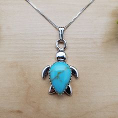 "Visit our on-line shop at: Etsy.com/shop/AlbuquerqueDesigns *sterling silver pendant necklace *sea turtle pendant with silver box chain 18\" *southwestern jewelry *kingman turquoise *calibrated pre-cut stones: big 15x10mm teardrop shape *all jewelry items are made to ship, slight variations in stones will occur comparing to pictures *size of a penny is 19mm or a dime is 18mm in diameter for comparing size with jewelry items *handcrafted in USA *free convenient gift box *free shipping in US, shi Sterling Silver Turquoise Jewelry With Lobster Clasp, Sterling Silver Turquoise Necklace Gift, Sterling Silver Turtle Necklace For Gifts, Sterling Silver Turtle Jewelry Gift, Turtle Shaped Sterling Silver Jewelry Gift, Sterling Silver Turtle Necklace For Gift, Adjustable Sterling Silver Turquoise Necklace For Jewelry Making, Sterling Silver Turquoise Necklace With Large Pendant For Gift, Adjustable Sterling Silver Turquoise Necklace Gift