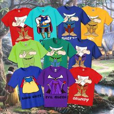 t - shirts with cartoon characters on them are displayed in front of a forest scene