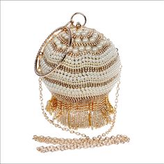 Simulated Pearl, Diamond, Rhinestones, Metal Crossbody Clutch Imported. For Wedding, Graduation, Holidays. Luxury Formal Bag With Beaded Fringe, Gold Tasseled Clutch For Evening, Gold Evening Clutch With Tassels, Gold Wedding Bag With Tassels, Elegant Evening Bags With Beaded Fringe, Elegant Evening Bag With Beaded Fringe, Gold Party Bag With Tassels, Gold Tassel Bags For Formal Occasions, Elegant White Bags With Tassels