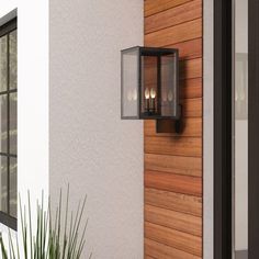 an outdoor light on the side of a house