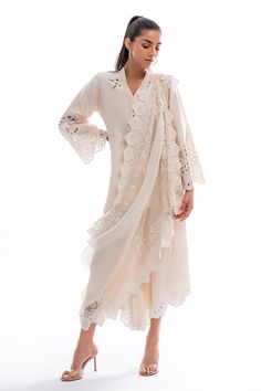 A short ivory rawsilk shirt is adorned with delicately rendered eyelet details all over. Paired with a pre draped dupatta with composed embroidery and matching box pants. Raw Silk Kurta, Sania Maskatiya, Printed Organza, Diy Science, Dye Fabric, Summer 2025, Lawn Suits, Indian Clothing, Eid Collection