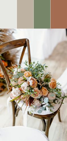 a chair with flowers and greenery on it in front of a color swatch