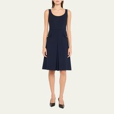 Oscar de la Renta dress with an inverted pleat Scoop neckline Sleeveless Hip flap buttoned pockets Knee length A-line silhouette Back zip Virgin wool/elastane/nylon/polyamide Dry clean Made in Italy Chic Sleeveless A-line Dress With Box Pleat, Sleeveless Midi Dress With Box Pleat For Formal Occasions, Formal Sleeveless Dress With Box Pleat, Elegant Sleeveless Midi Dress With French Seams, Formal A-line Dresses With Pockets, Chic Sleeveless Dress For Work, Elegant Sleeveless A-line Dress With Box Pleat, Classic Sleeveless Midi Dress With Pleated Waist, Formal A-line Midi Dress With Elastane